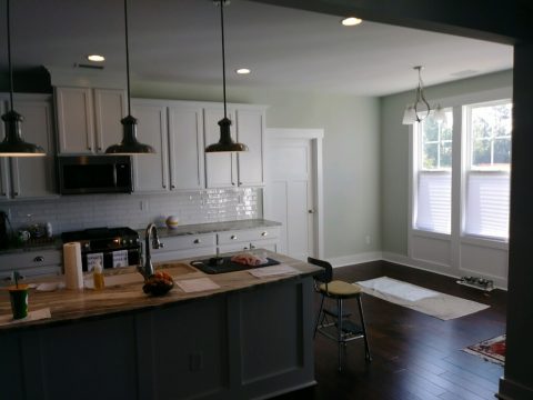 Dark Island and White Kitchen Cabinets